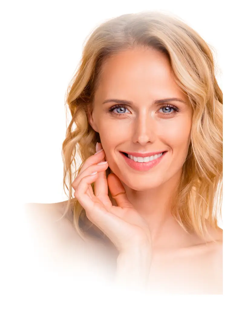 Smiling blonde woman touching her face