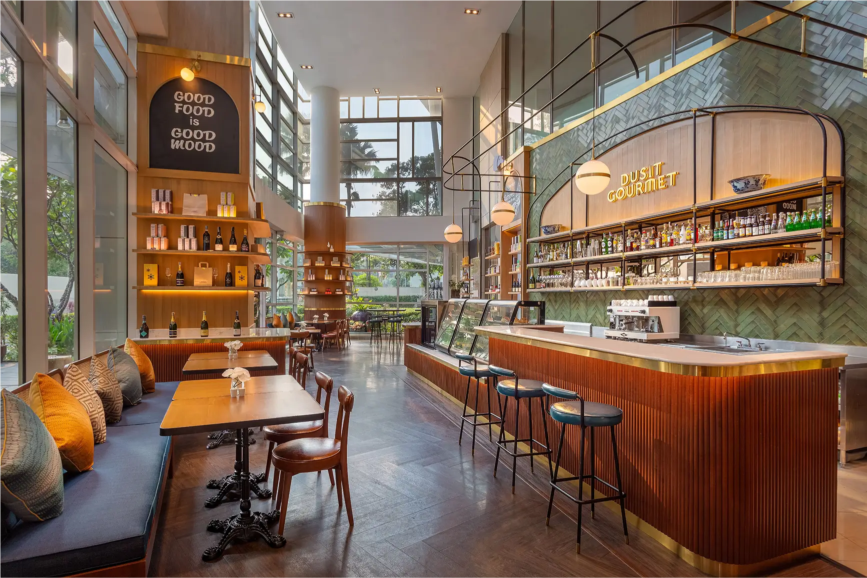 Modern café with wooden interior and counter at Dusit Gourmet.