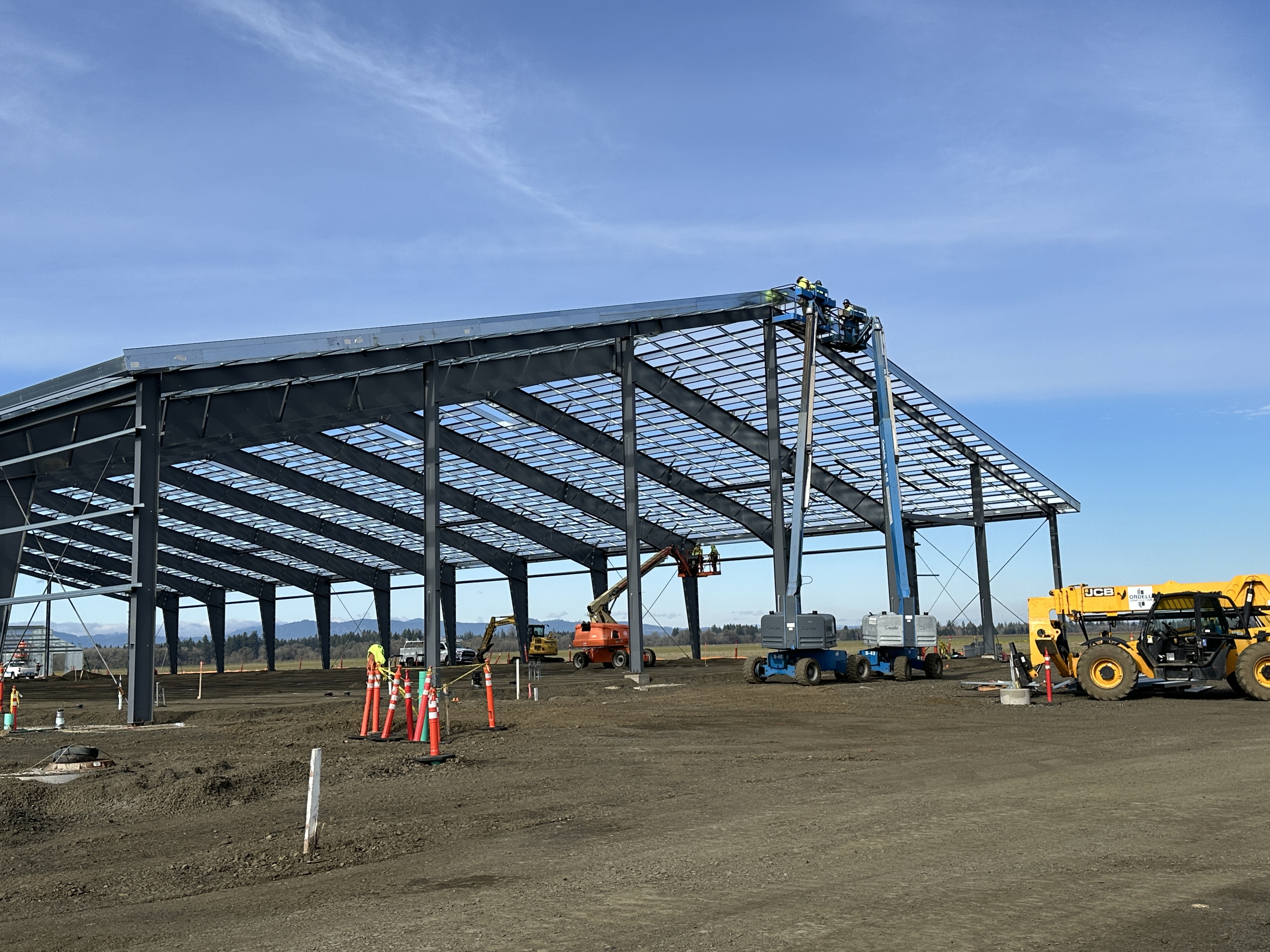 LBCC Agricultural Center Update! We stopped by the site today and this project is really MOOving along. The nearly 40,000 SF arena is well underway, and the livestock barns...