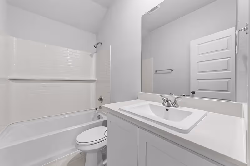 Bathroom with tub/shower combination and single sink