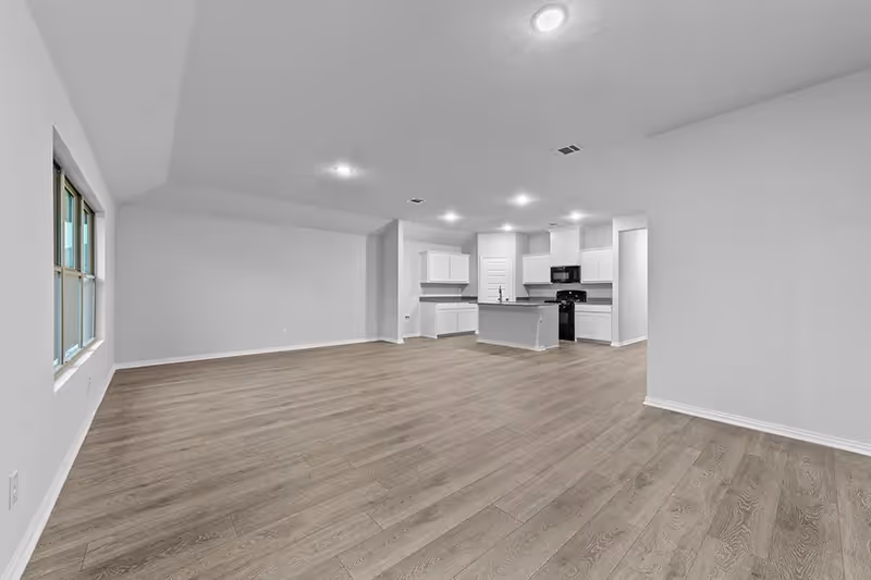 open living room with vinyl flooring