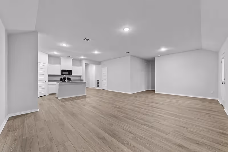 Open living room with vinyl flooring