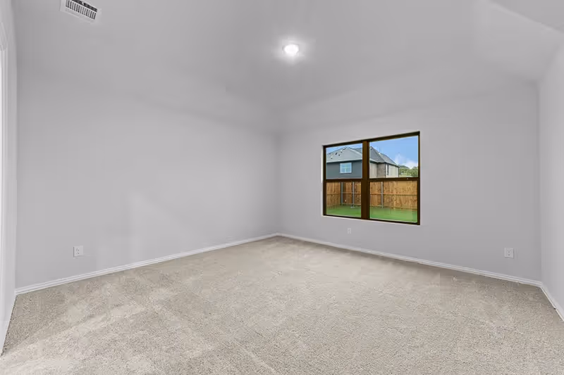 Bedroom with carpet and one window