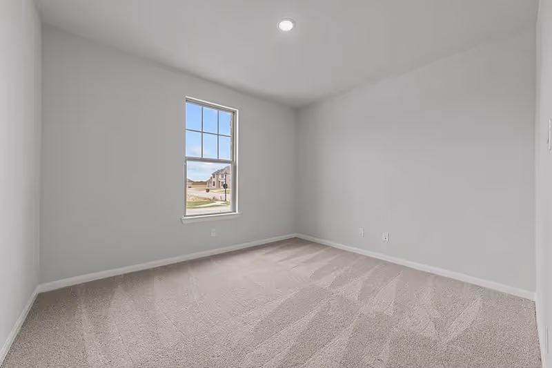 Bedroom with carpet and 1 window