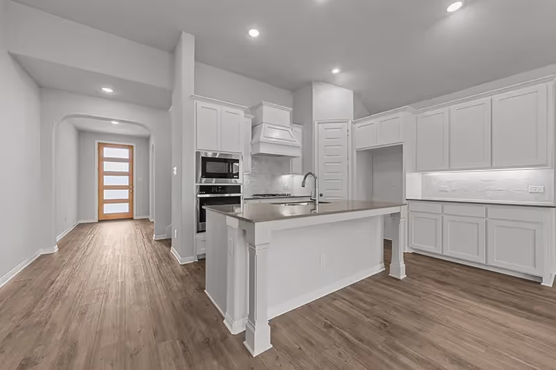 Entryway to kitchen with island