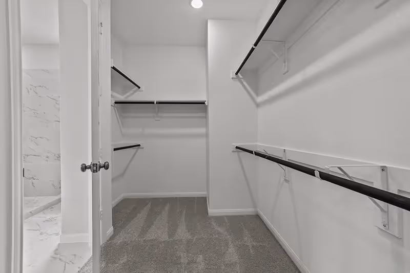 Walk in closet in owners suite