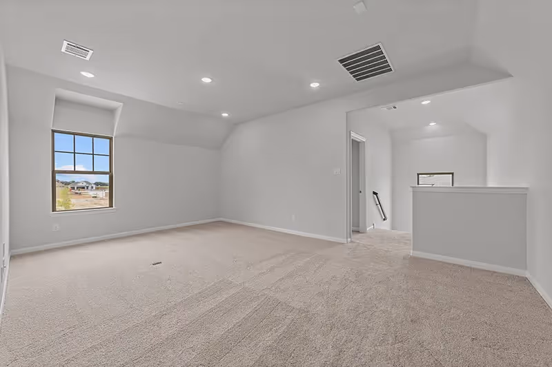 Game room with window and stair entry