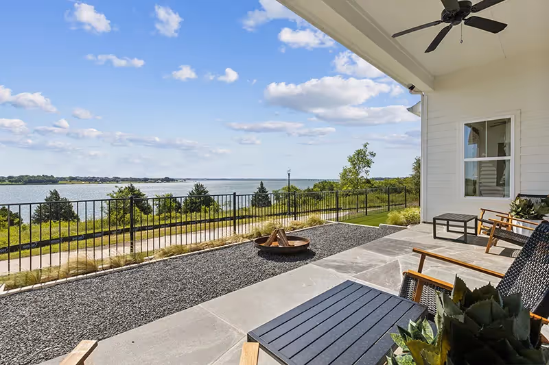 side covered patio overlooking the lake 