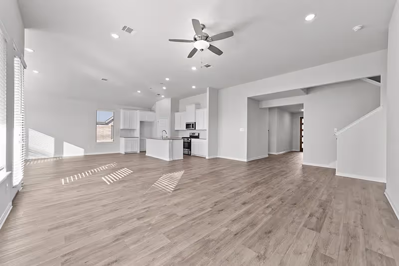 open concept living, dining and kitchen