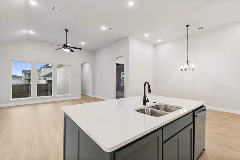open concept living and dining with kitchen island