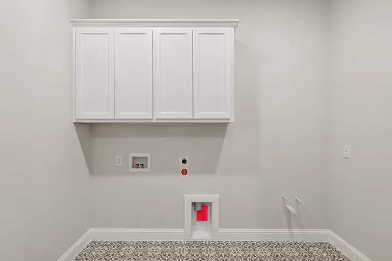 laundry room with pattern tile