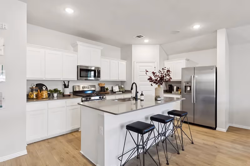kitchen with white cabinets