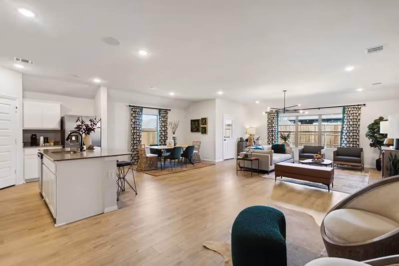 open concept living room, kitchen and dining area