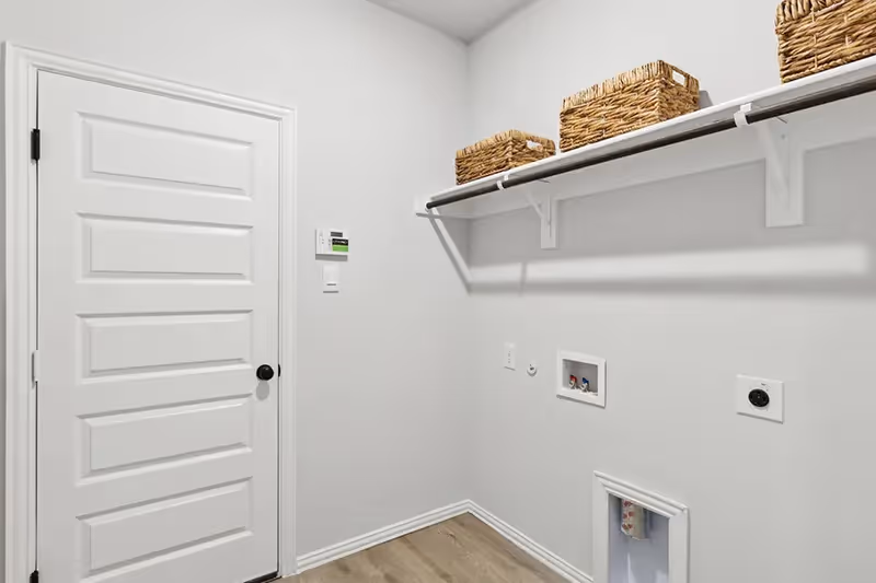 laundry room with shelf 
