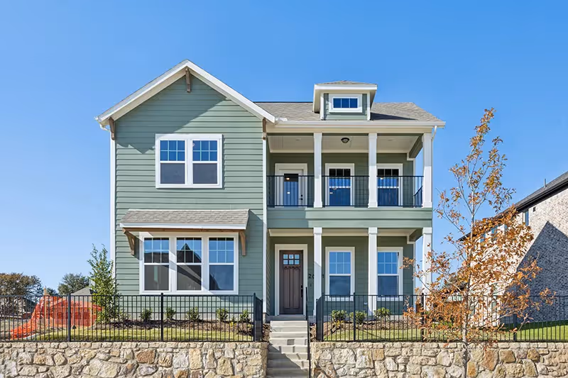 black and white drawing of 2 story peyton plan with front balcony (craftsman elevation)