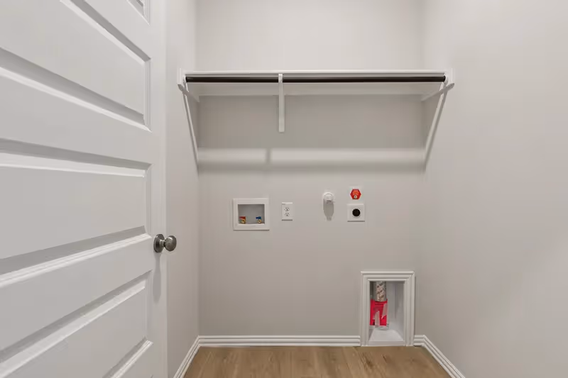 laundry room with shelf