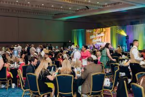 Guests seated at tables during The Osceola Chamber’s 99th annual meeting. 