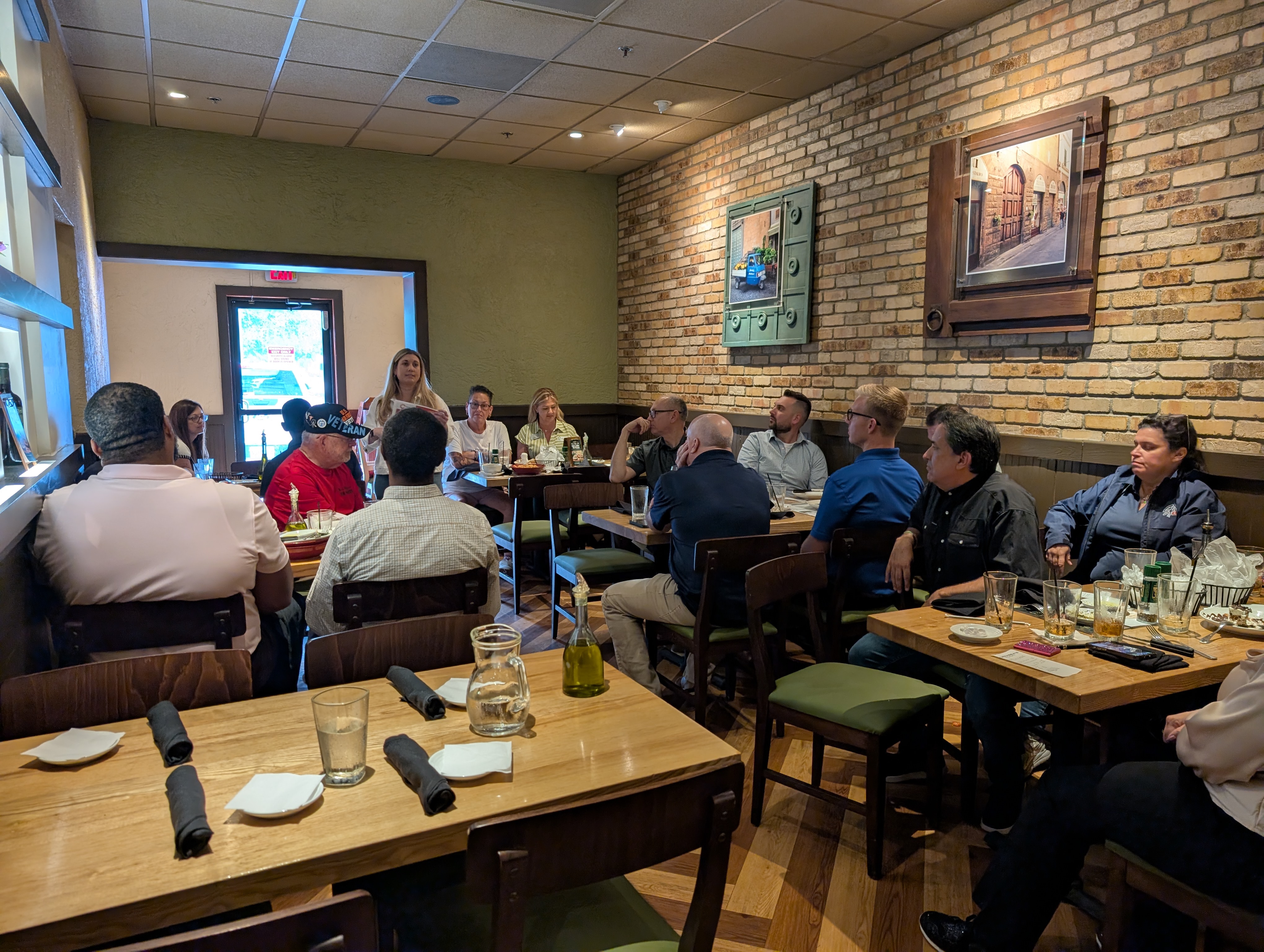 Group gathering at The Osceola Chamber's event First Friday