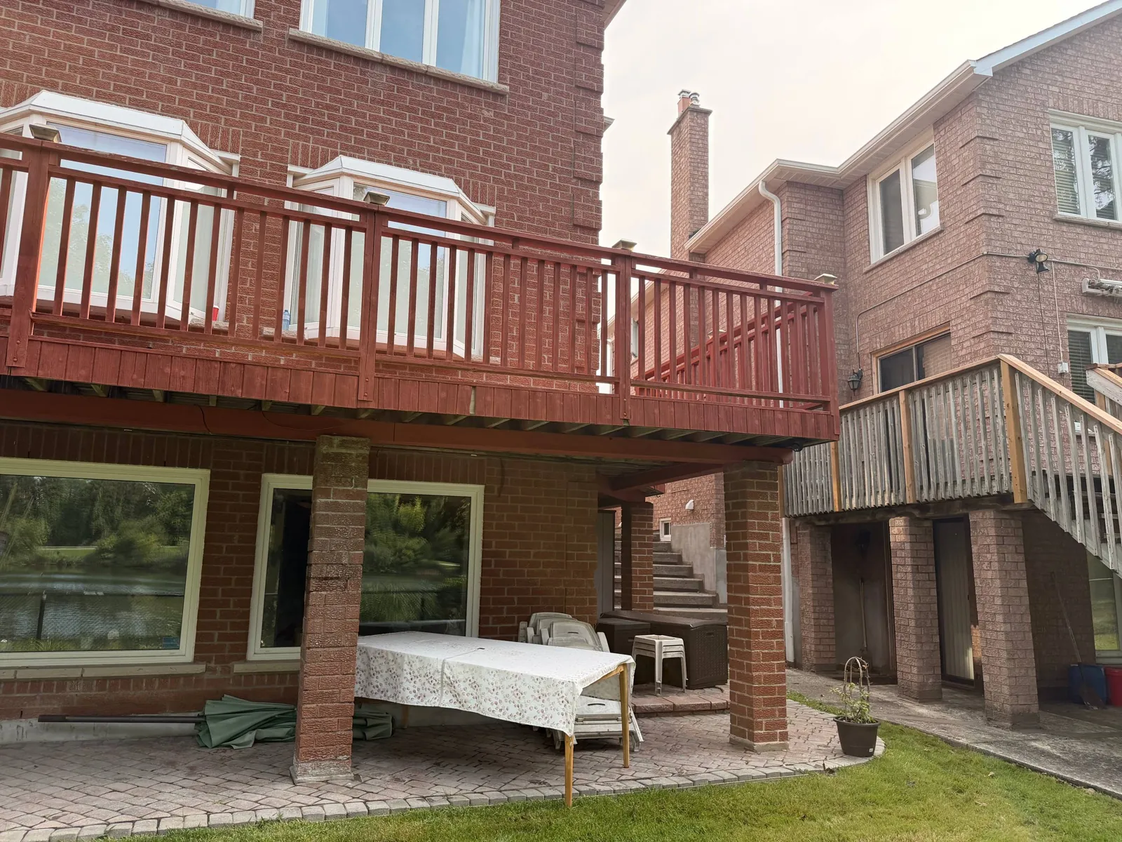 Brampton Deck Restoration: Failing Solid Stain Removed, Cedar Deck Sanded and Refinished with Oil-Based Stain