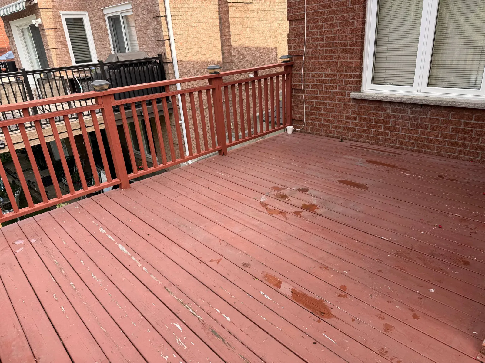Brampton Deck Restoration: Failing Solid Stain Removed, Cedar Deck Sanded and Refinished with Oil-Based Stain