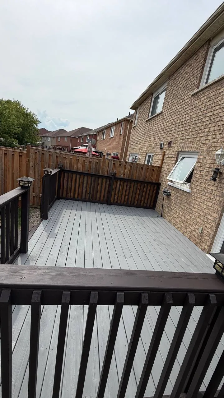 Grey Deck Refinished in Brampton: Peeling Stain Sanded Off, Two-Tone Finish with Sherwin-Williams Solid Stain and Dark Railings