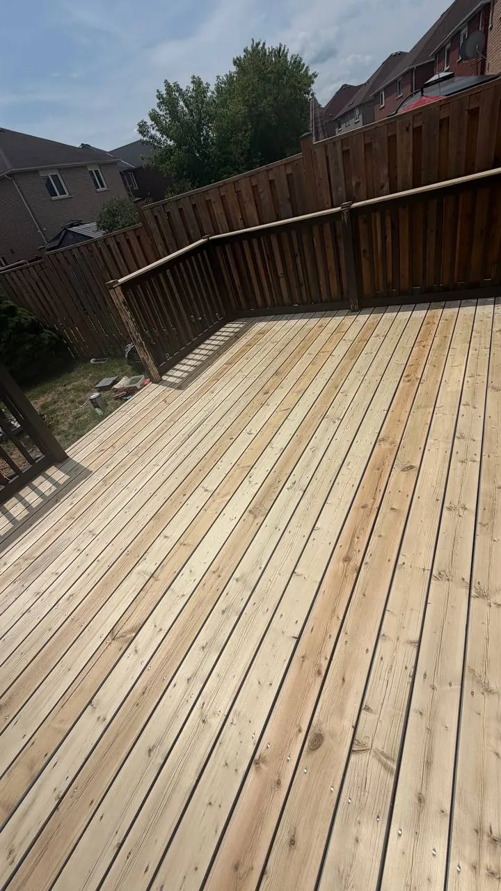 Grey Deck Refinished in Brampton: Peeling Stain Sanded Off, Two-Tone Finish with Sherwin-Williams Solid Stain and Dark Railings
