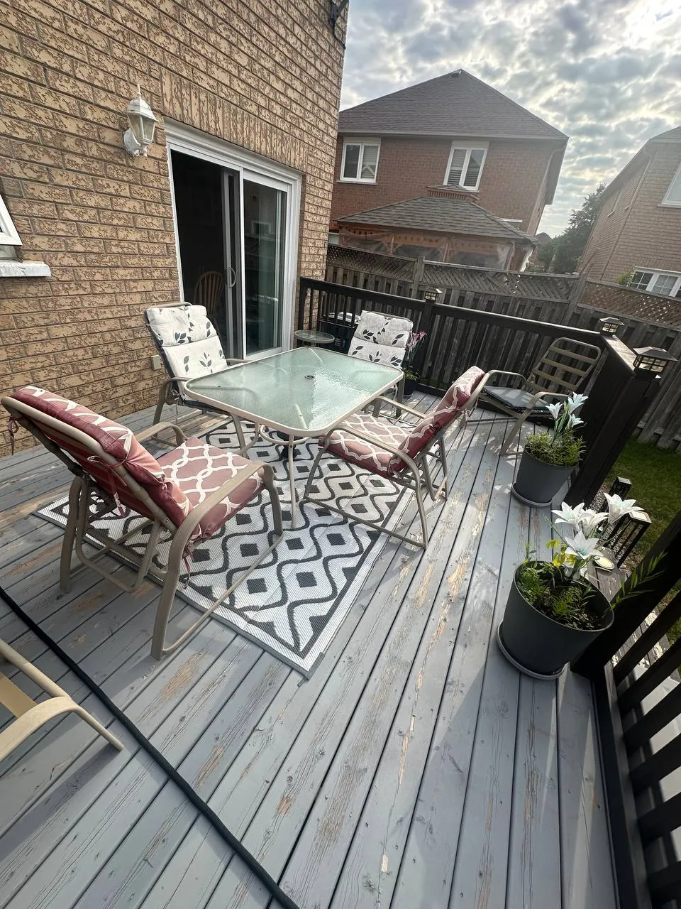 Grey Deck Refinished in Brampton: Peeling Stain Sanded Off, Two-Tone Finish with Sherwin-Williams Solid Stain and Dark Railings