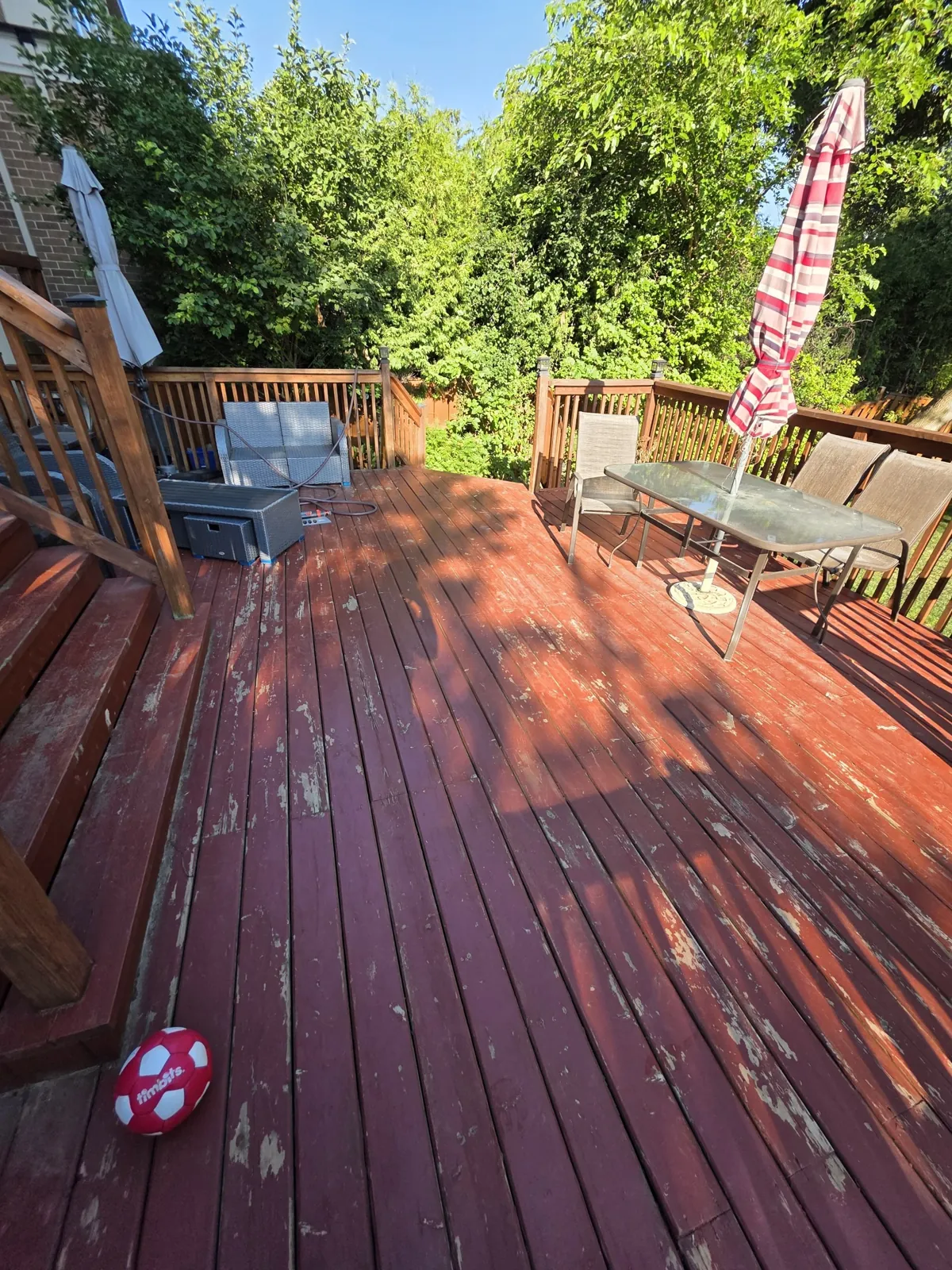 Backyard Deck Restoration in North York: Peeling Solid Stain Removed, Semi-Transparent Oil Finish, Railings Repaired and Refreshed