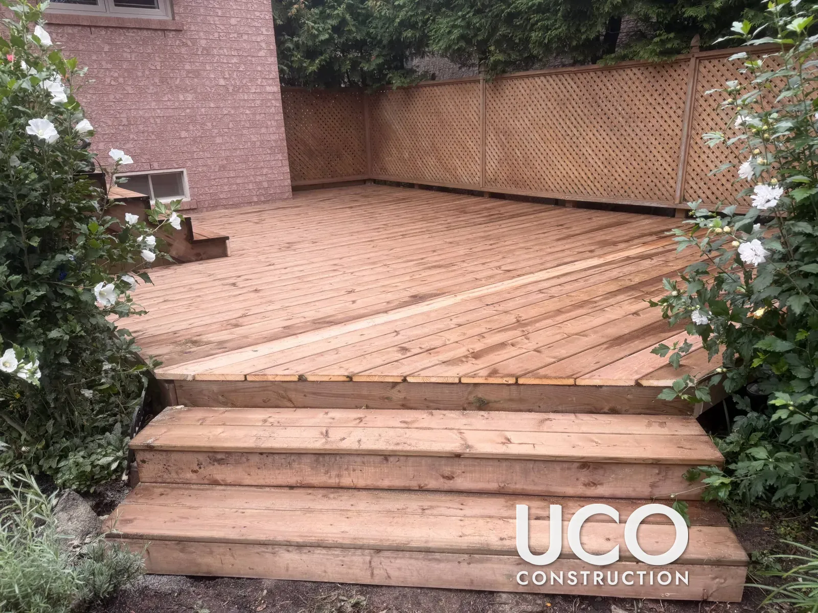 Deck Board Replacement in Oakville: Rotten, Delaminating Deck Boards and Stairs Removed and New Pressure-Treated Decking Installed on the Existing Frame