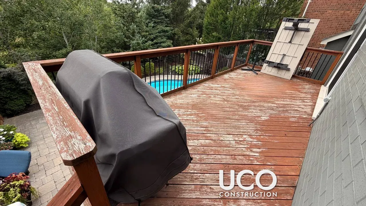 Pool Deck Restoration in Oakville: Peeling Red Solid Stain Removed, Deck Boards Refinished in a Grey-Brown Semi-Transparent Stain and Railings Recoated to Match