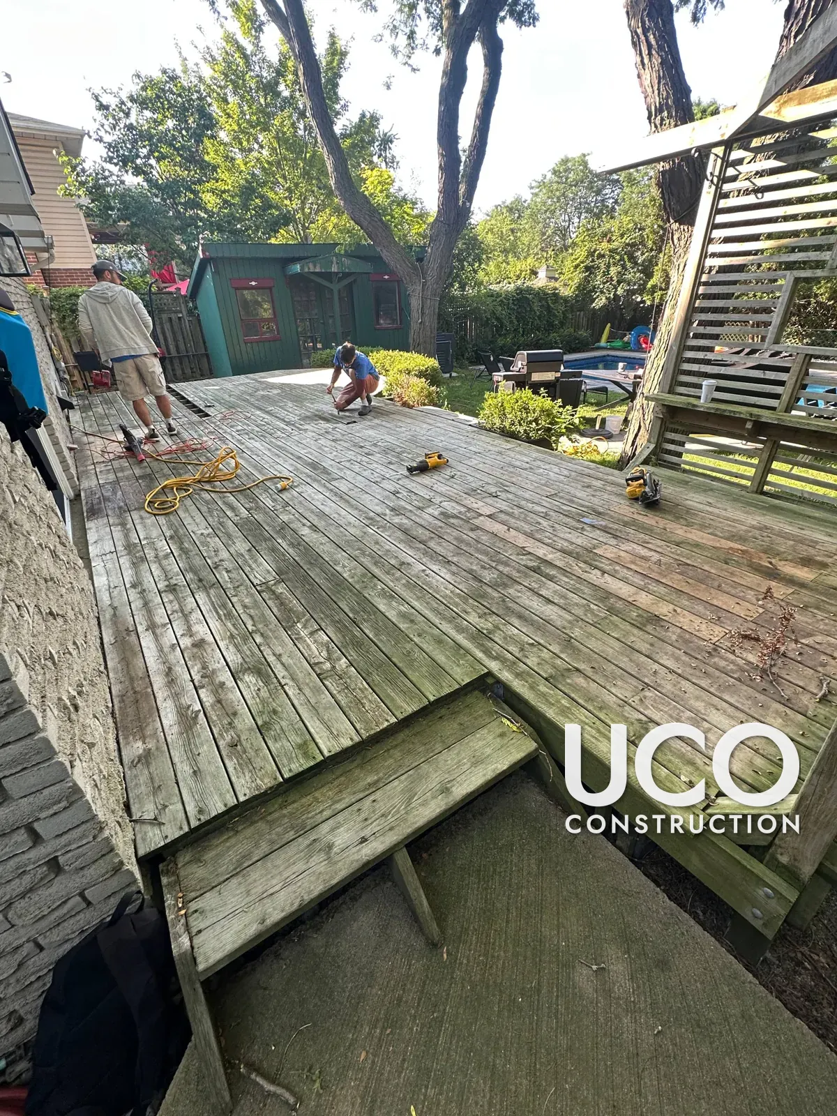Pool-Side Deck Restoration in Mississauga: Grey Weathered Deck Sanded to Bare Wood, Rotten Boards Replaced and Refinished in a Warm Oil-Based Stain
