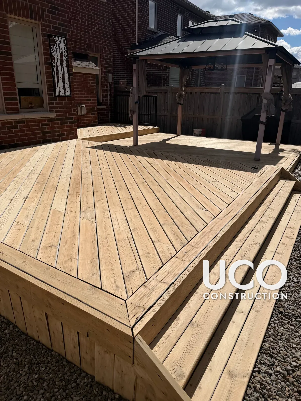 Deck Restoration in Georgetown: Grey Weathered Pressure-Treated Deck Sanded to Bare Wood and Refinished With Oil-Based Stain, Stairs and Skirting Included