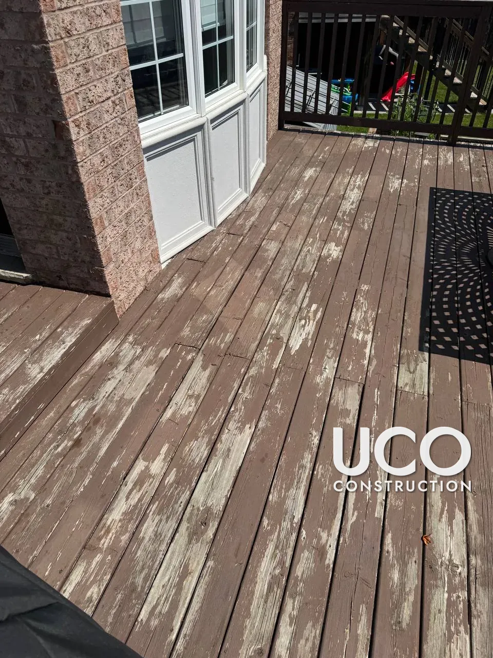 Deck Restoration and New Aluminum Railings in Woodbridge: Peeling Solid Stain Sanded Off, Deck Oil-Stained, Black Aluminum Railings and Stairs Installed