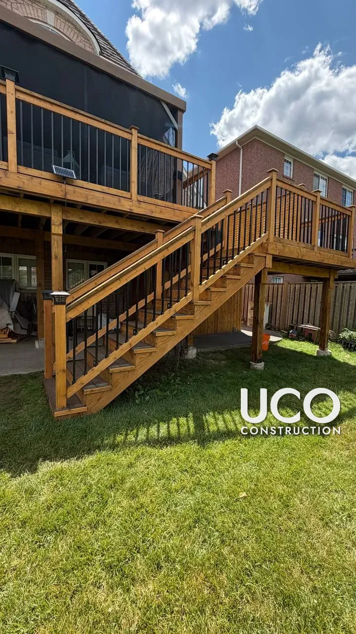Deck Railings, Skirting and Privacy Screens Restained in Brampton: Grey Weathered Wood Around a Composite Deck Sanded and Stained