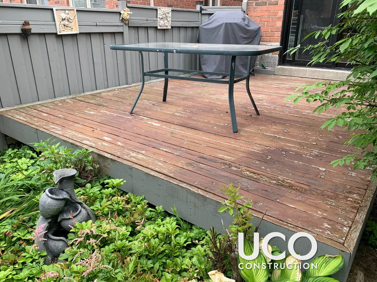 Deck Restoration in Thornhill: Peeling Red Stain Sanded Off, Damaged Boards Replaced and Deck Refinished in a Grey-Brown Semi-Transparent Stain
