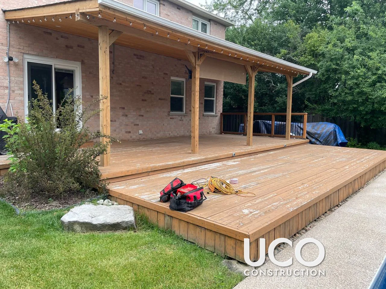 Covered Deck Restoration in Richmond Hill: Two-Level Pool Deck With Roof Sanded to Bare Wood and Refinished in a Warm Cedar Oil-Based Stain