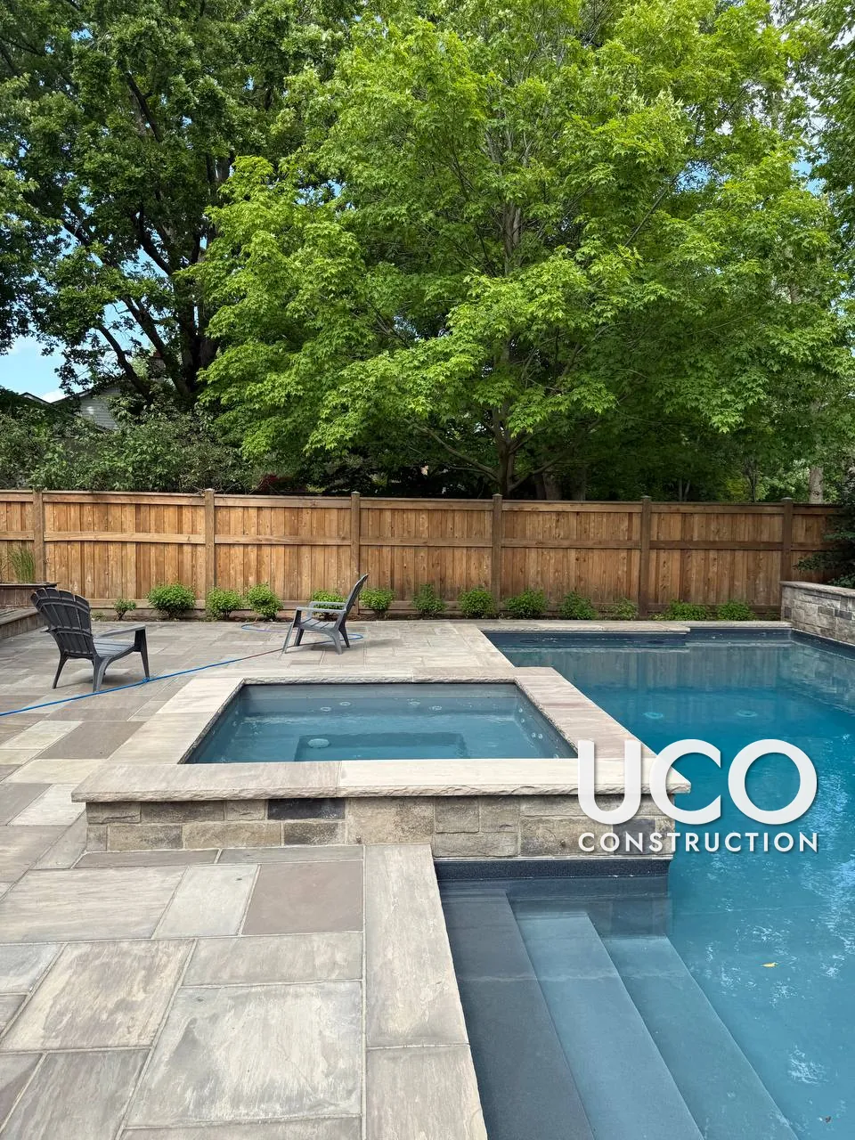 Cedar Privacy Fence Restoration in Oakville: Grey Pool-Yard Fence Cleaned With Wood Cleaner, Power Washed, Sanded and Stained in a Warm Cedar Tone