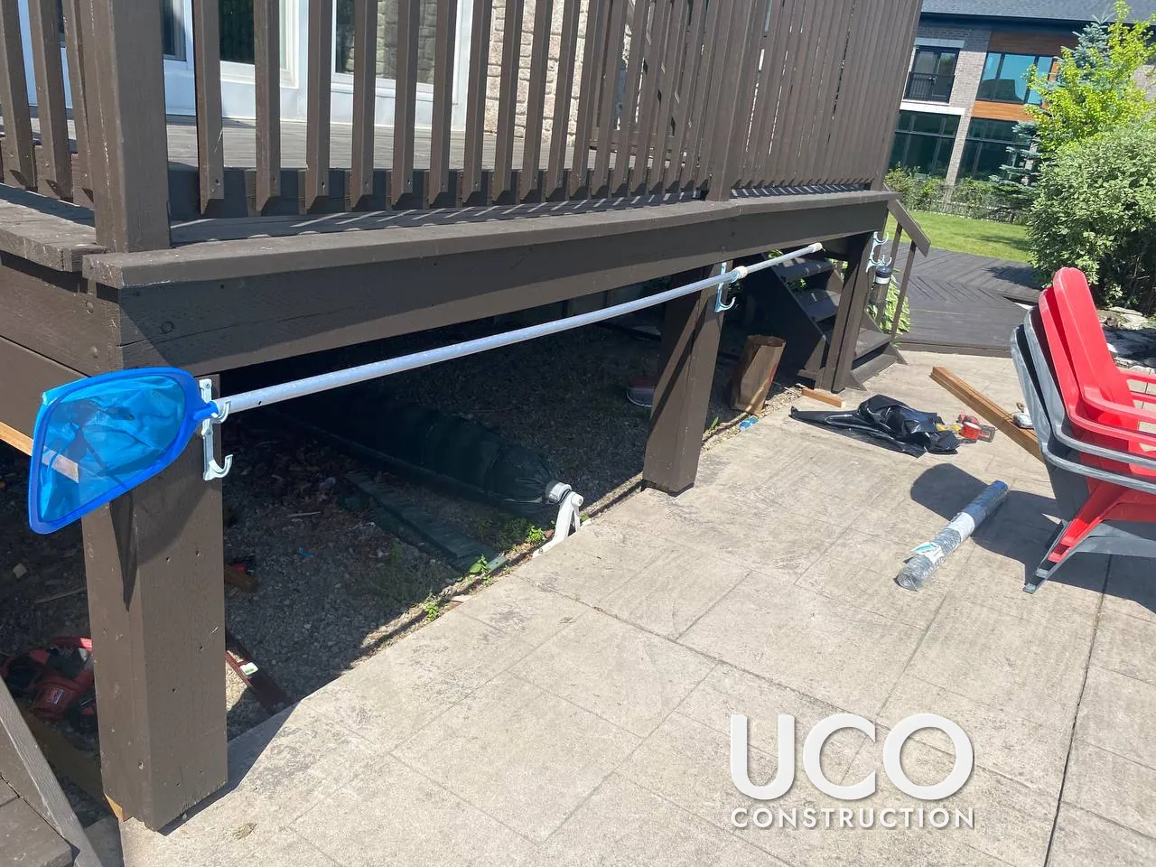 Deck Animal Proofing in Bolton: Open Underside of a Raised Deck Closed With Wood-Framed Galvanized Wire Mesh Skirting to Keep Raccoons and Skunks Out