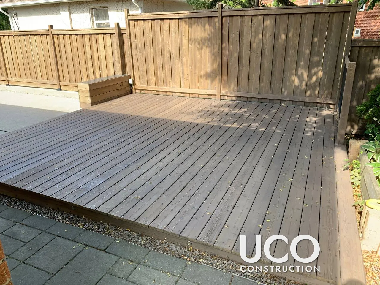 Deck Staining in Etobicoke: Weathered Grey Ground-Level Deck Pressure Washed, Sanded, Colour-Tested and Refinished in a Grey-Brown Oil-Based Stain