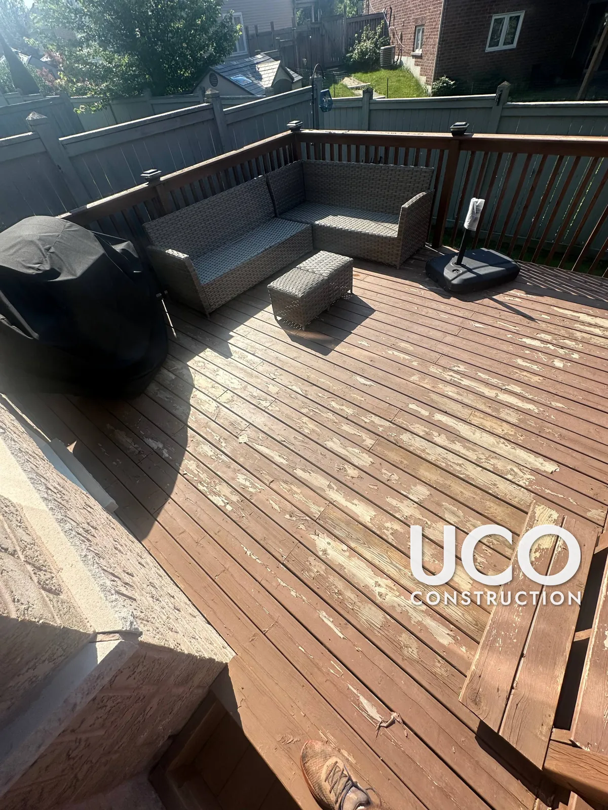 Deck Staining in Ajax: Two-Level Deck With Peeling Red-Brown Solid Stain Sanded to Bare Wood and Refinished in a Warm Cedar Stain