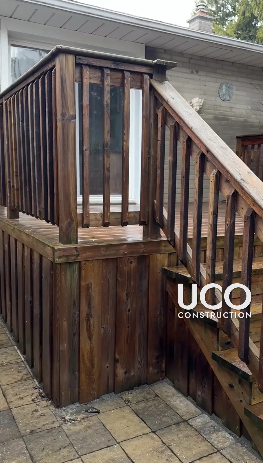Deck Cleaning and Staining in Aurora: Grey, Mildewed Deck With Stairs, Railings and Skirting Power Washed and Refinished in a Cedar Stain