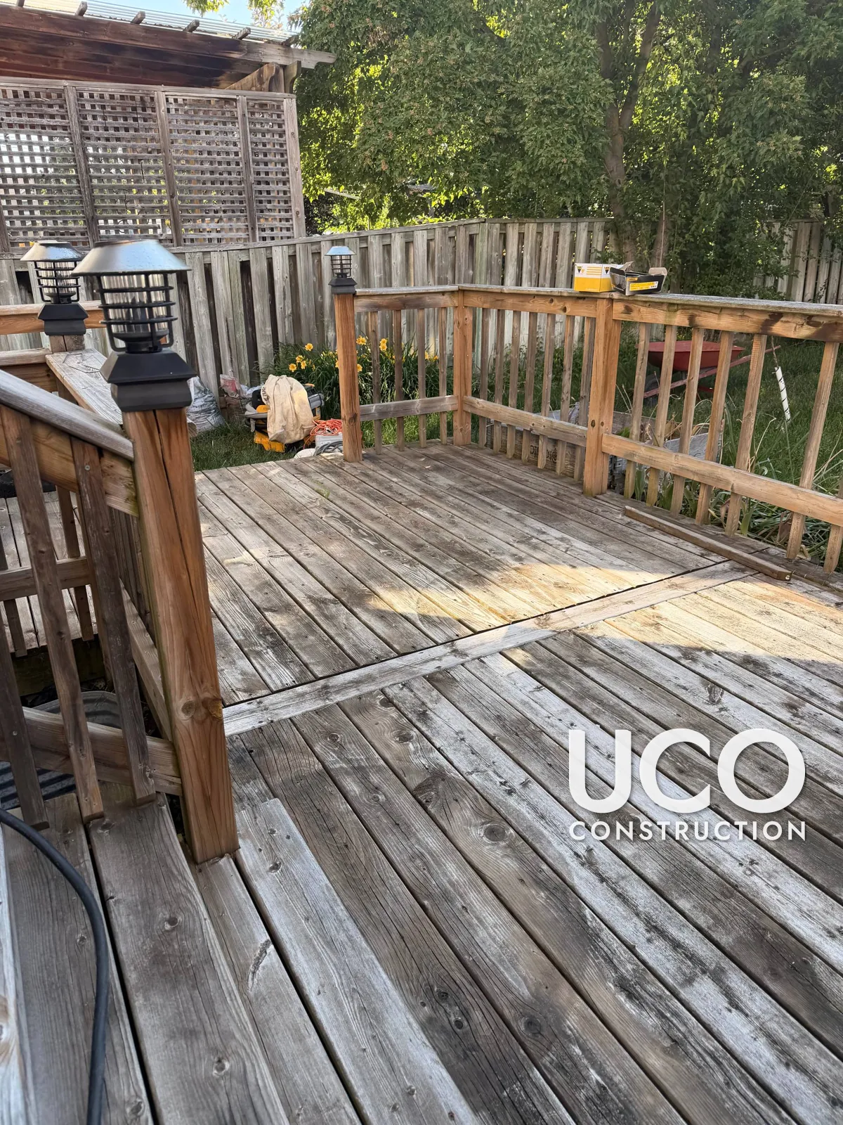 Deck Staining in Mississauga: Grey, Weathered Deck and Wood Railings Refinished in a Redwood Cedar Stain