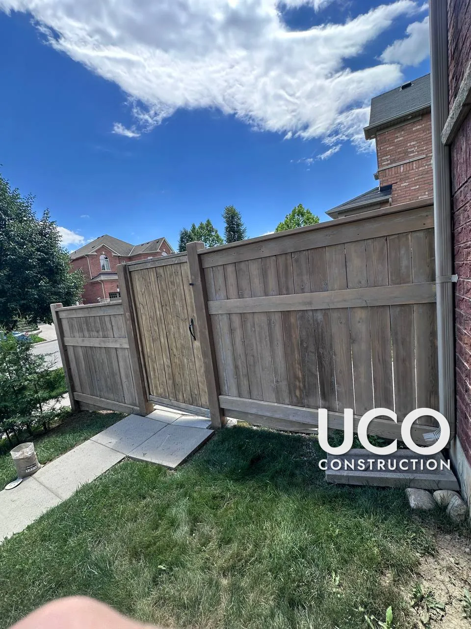 Fence Staining in Brampton: Grey, Weathered Privacy Fence and Gate Sanded and Stained Dark Brown