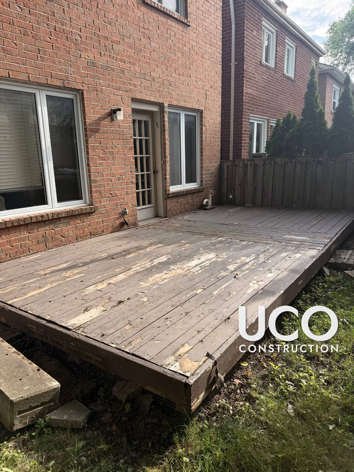 Painted Deck Restoration in Thornhill: Peeling Deck Paint Sanded Off to Bare Wood and Refinished in a Brown Deck Stain