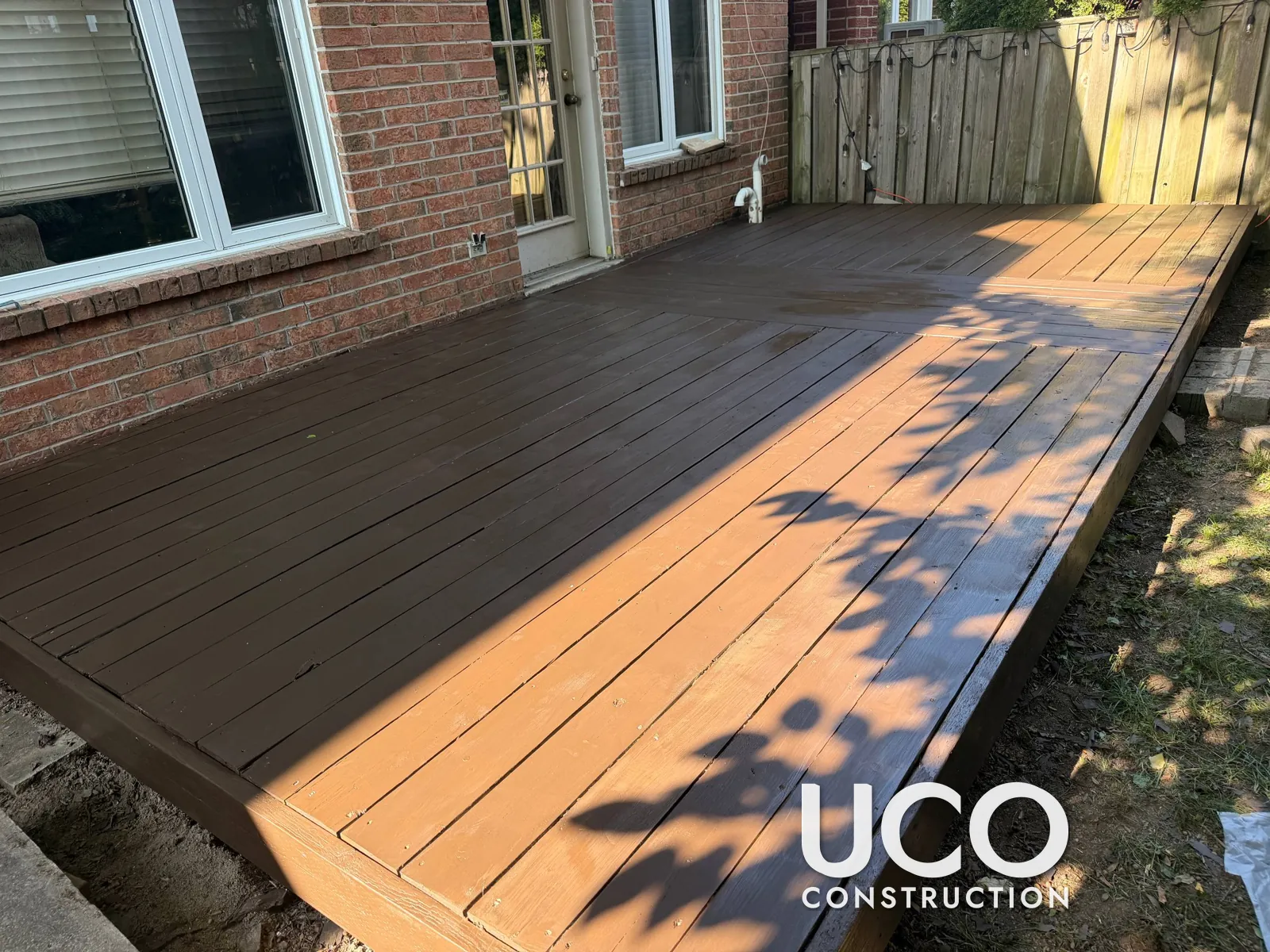 Painted Deck Restoration in Thornhill: Peeling Deck Paint Sanded Off to Bare Wood and Refinished in a Brown Deck Stain