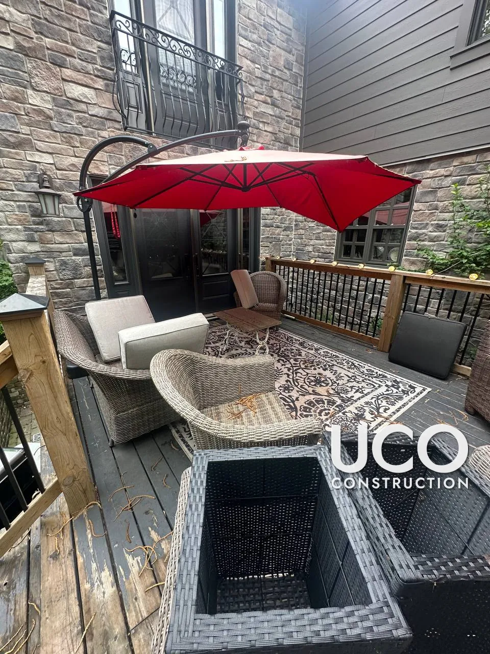 Deck Staining in Etobicoke: Peeling Dark Grey Solid Stain Sanded Off and Deck Refinished in a Rich Dark Brown Penetrating Stain