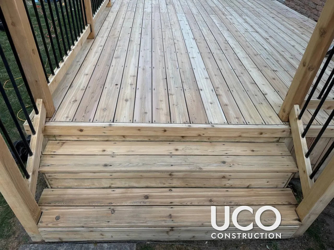 Deck Staining in Markham: Peeling Solid Stain Sanded Off a Deck, Stairs and Railings and Refinished in a Warm Cedar Stain
