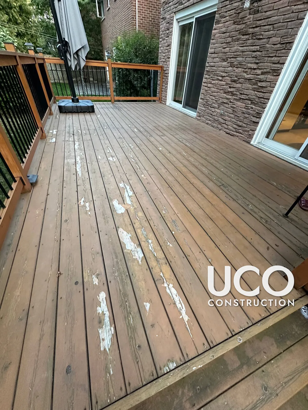 Deck Staining in Markham: Peeling Solid Stain Sanded Off a Deck, Stairs and Railings and Refinished in a Warm Cedar Stain