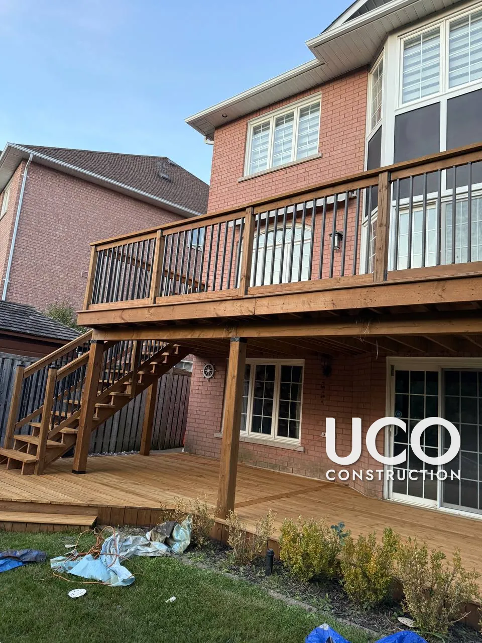 Deck Staining in Ajax: Two-Level Deck With Staircase, Railings and Lower Patio Deck Stained After Colour Sampling