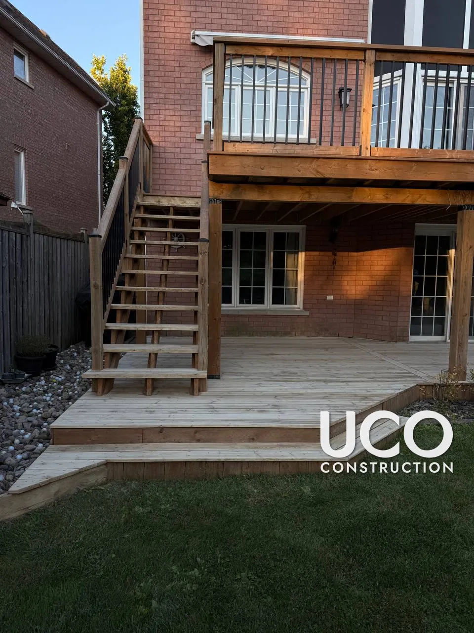 Deck Staining in Ajax: Two-Level Deck With Staircase, Railings and Lower Patio Deck Stained After Colour Sampling